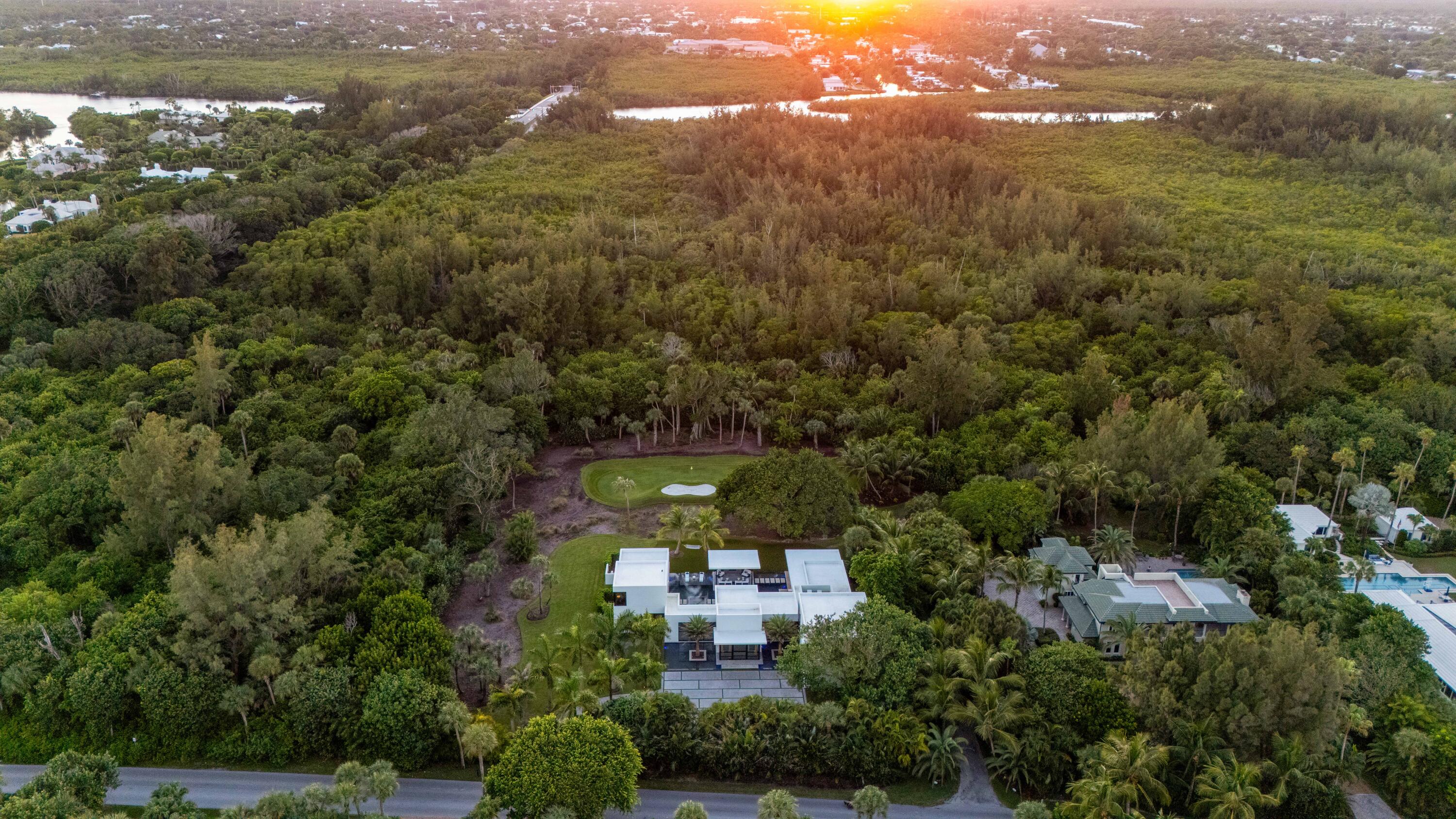 12 North Beach Road Jupiter Island, FL 33455 - Photo 85 of 95 an aerial view of a houses with city and lake view