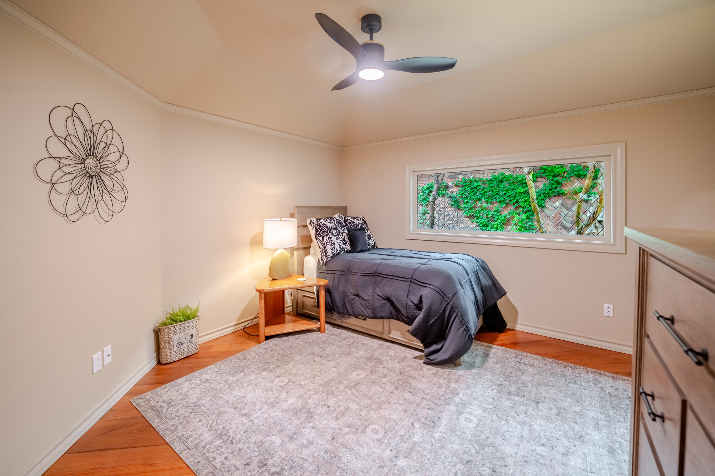 4226 97th Place Lubbock, TX 79423 - Photo 32 of 52 a bedroom with a bed and a window