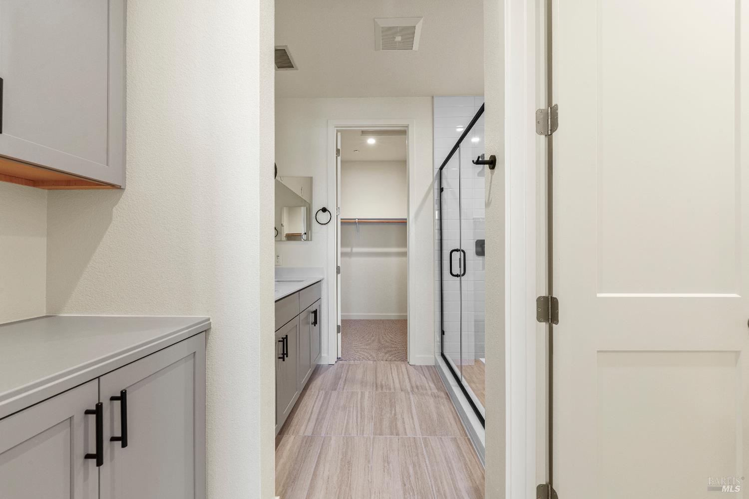 209 Wellness Way Rohnert Park, CA 94928 - Photo 11 of 30 a view of a hallway with wooden floor and staircase