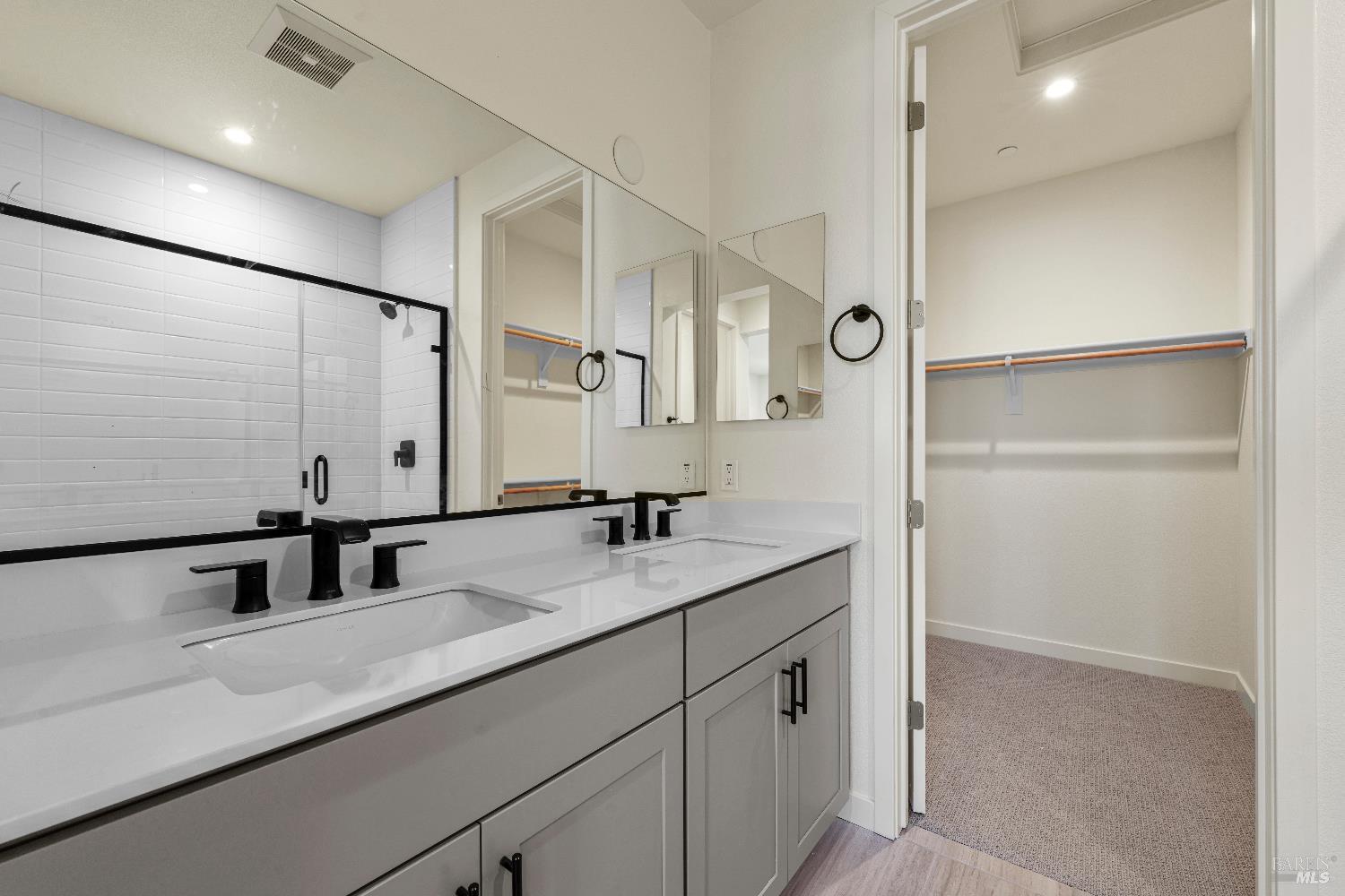 209 Wellness Way Rohnert Park, CA 94928 - Photo 12 of 30 a bathroom with a sink and a mirror