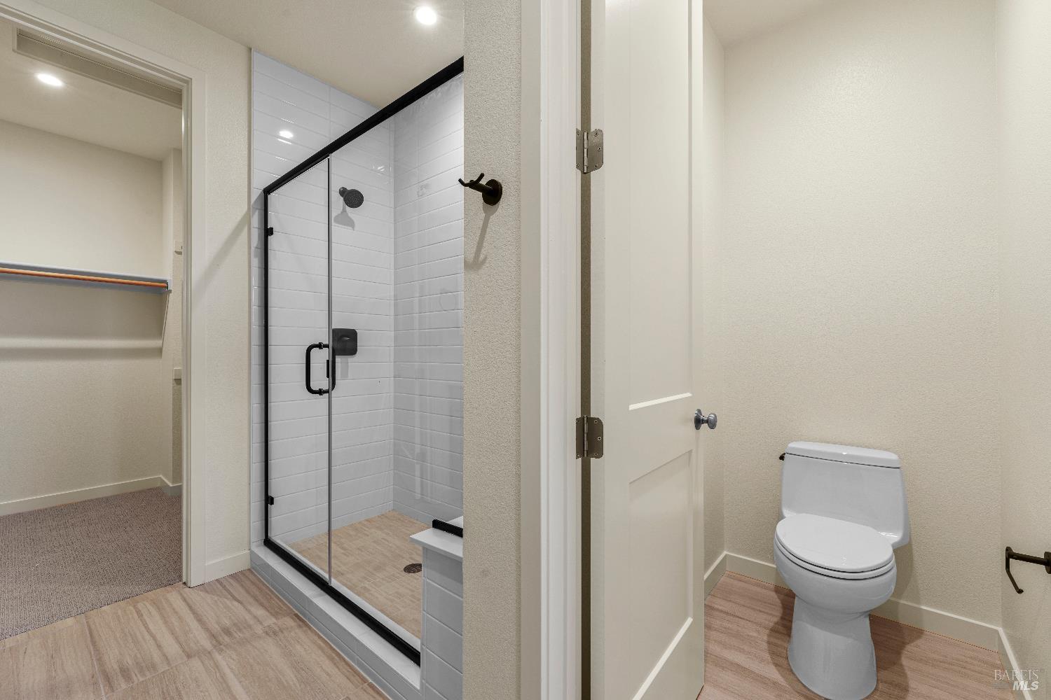 209 Wellness Way Rohnert Park, CA 94928 - Photo 15 of 30 a bathroom with a toilet and a shower