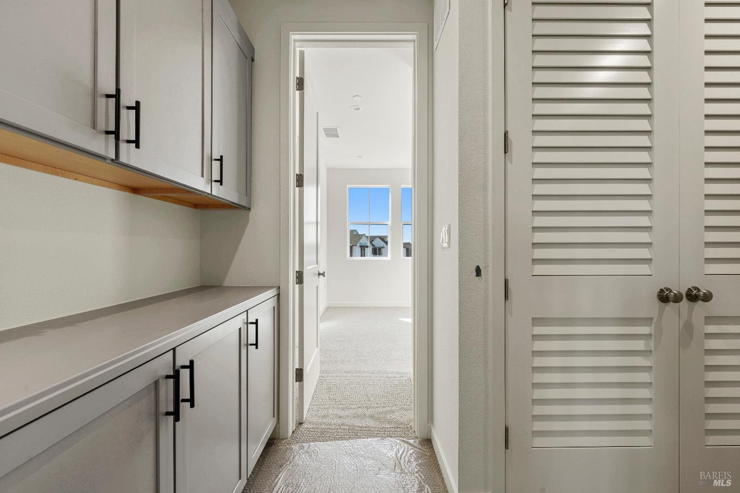 209 Wellness Way Rohnert Park, CA 94928 - Photo 19 of 30 a view of a kitchen from the hallway