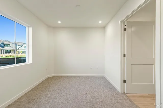 a bathroom with a shower sink and mirror