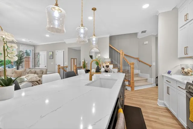 a living room with fireplace furniture and a flat screen tv