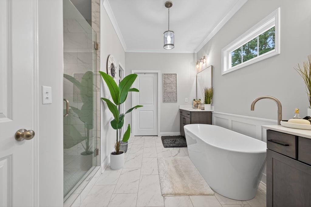 425 Retreat Lane Canton, GA 30114 - Photo 26 of 55 a bathroom with a toilet a sink and bathtub