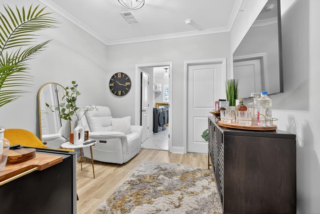 425 Retreat Lane Canton, GA 30114 - Photo 32 of 55 a living room with furniture and a table