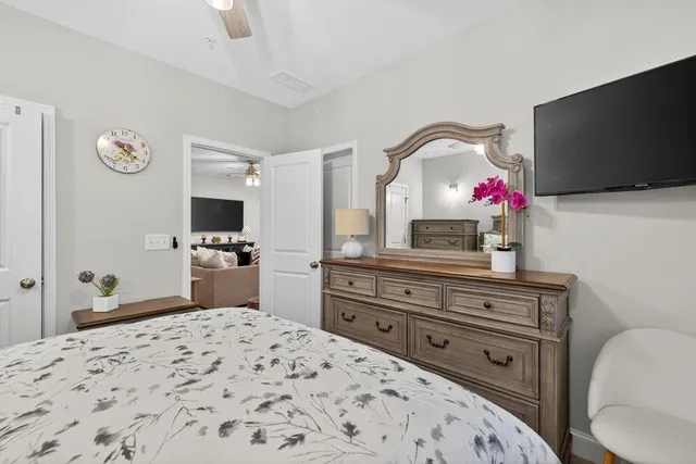 a outdoor living space with furniture and a potted plant