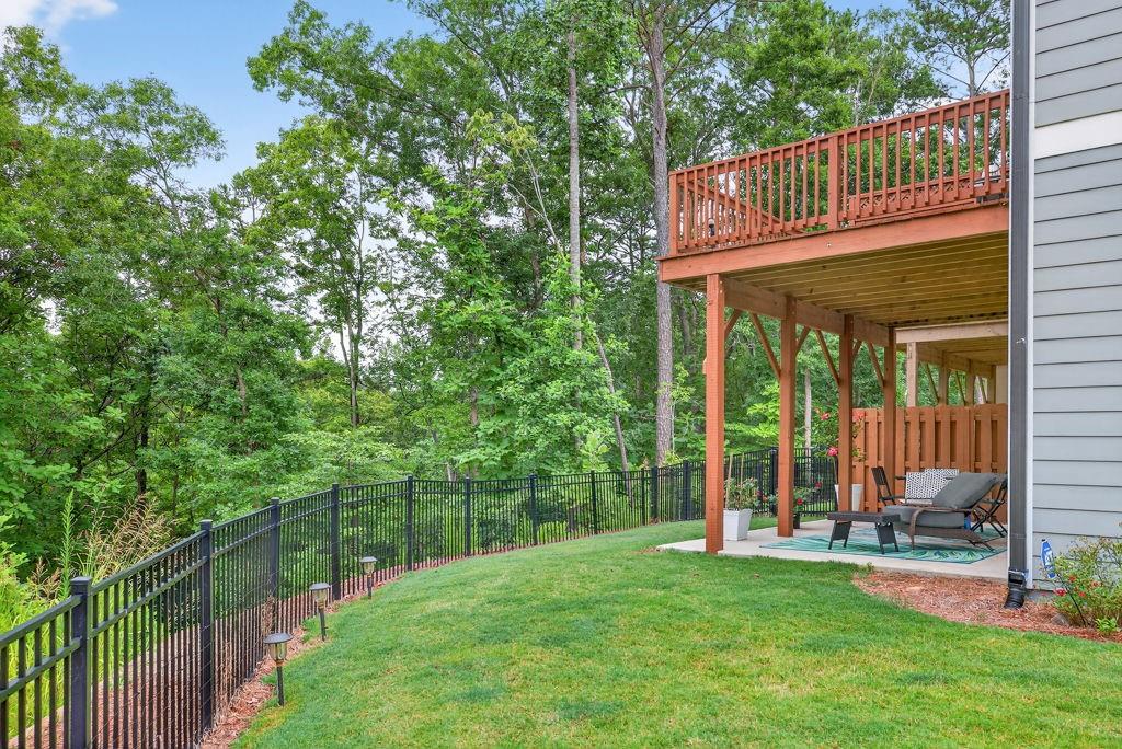 425 Retreat Lane Canton, GA 30114 - Photo 54 of 55 a view of a wooden deck with a backyard