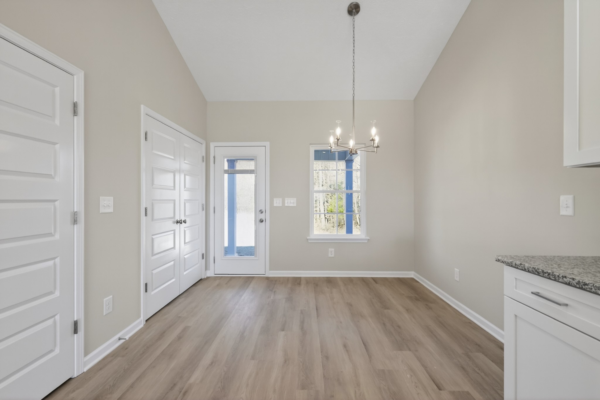 336 North Fork Branch Road Tullahoma, TN 37388 - Photo 15 of 34 a view of empty room with wooden floor and window