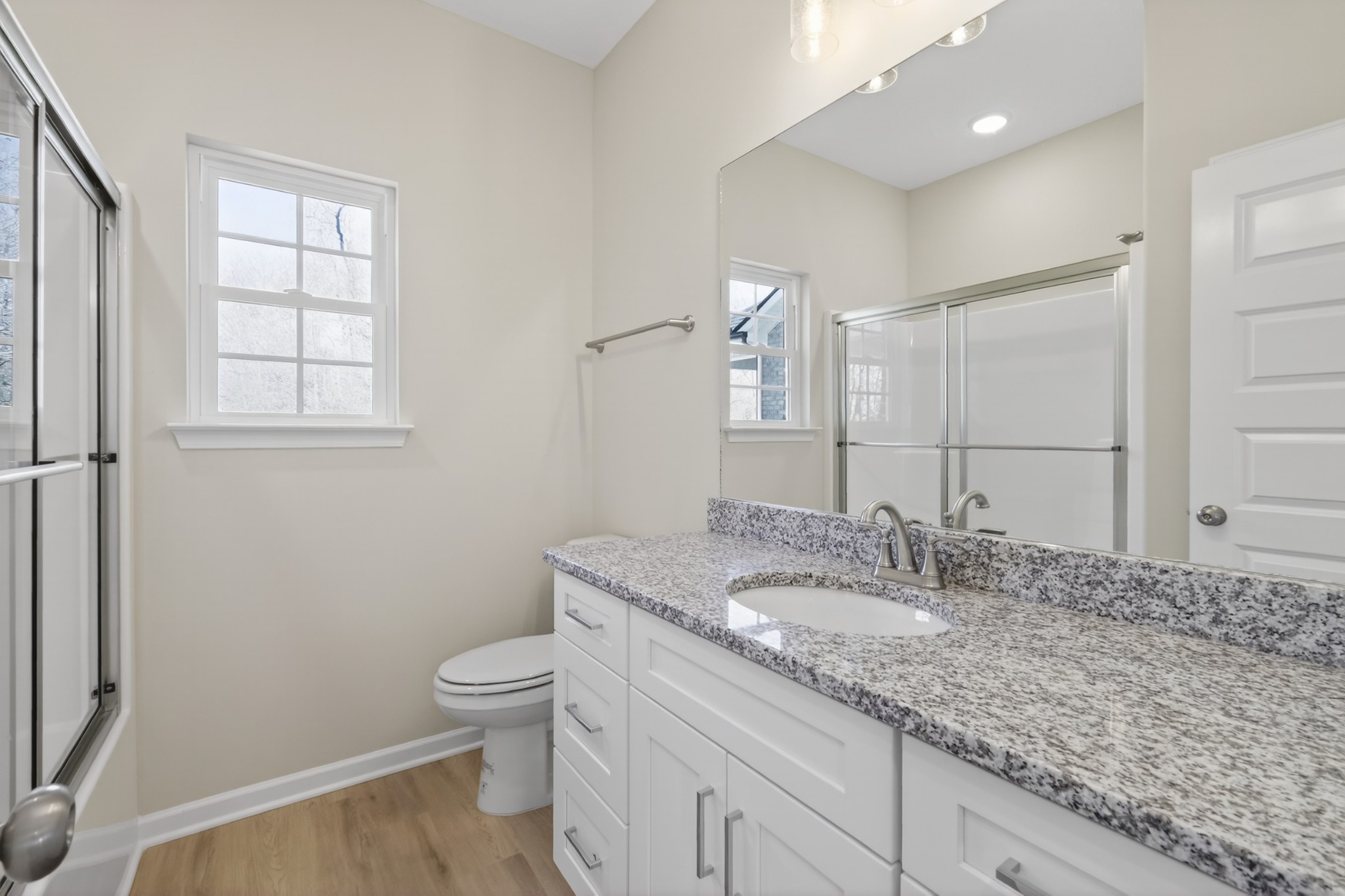 336 North Fork Branch Road Tullahoma, TN 37388 - Photo 20 of 34 a bathroom with a granite countertop sink a toilet and a mirror
