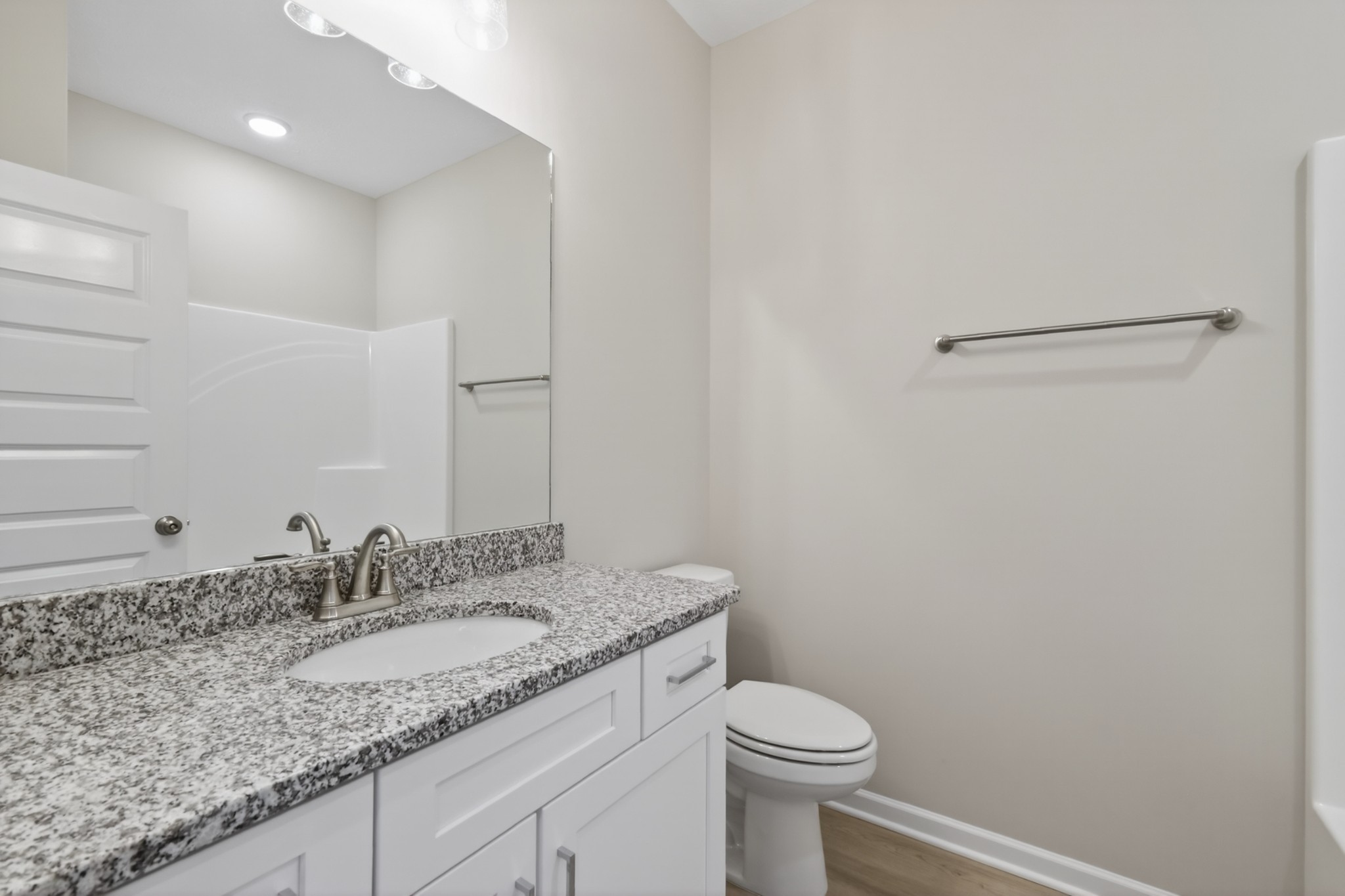 336 North Fork Branch Road Tullahoma, TN 37388 - Photo 26 of 34 a bathroom with a granite countertop sink and a mirror