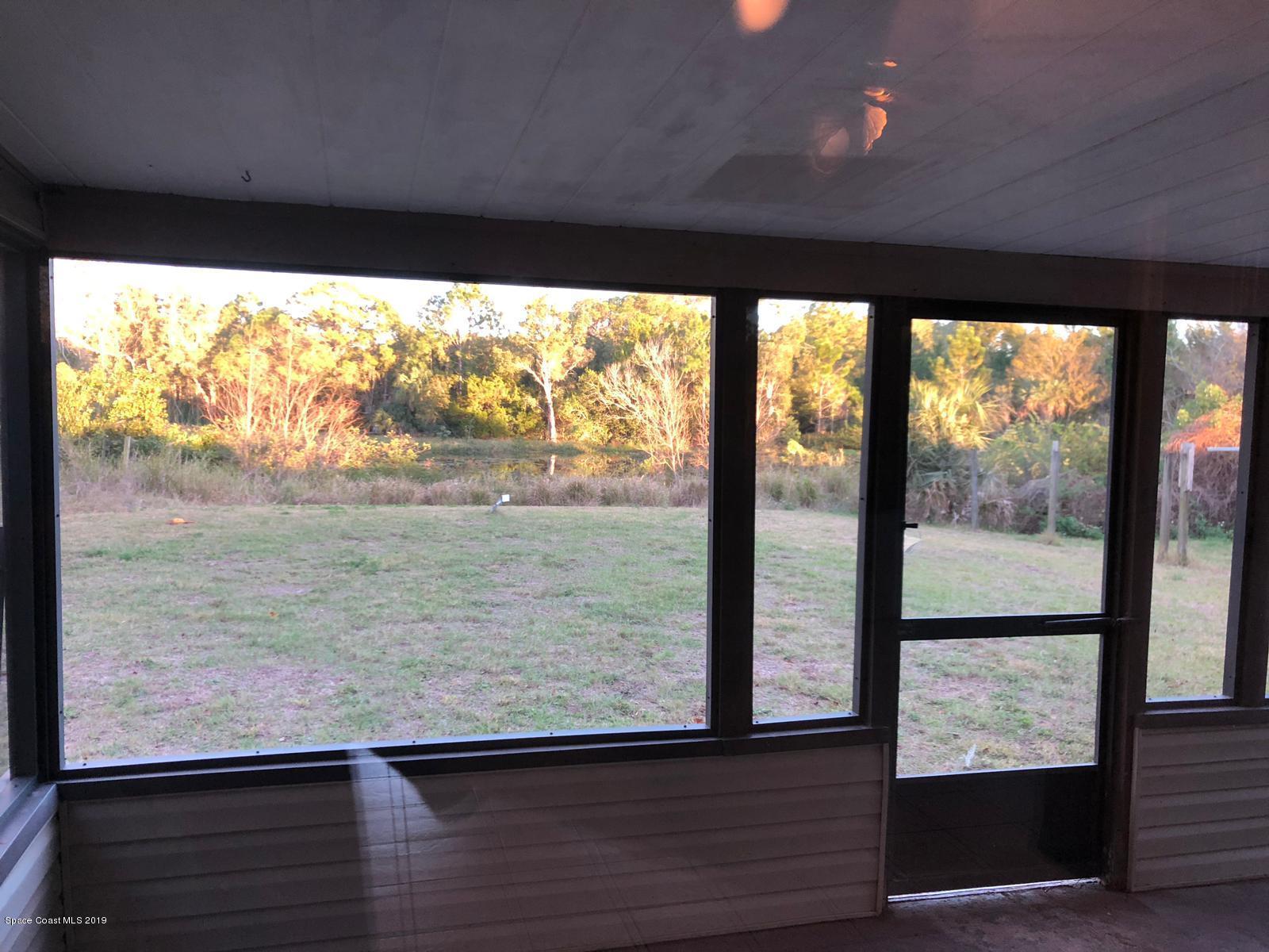 2465 Dolphin Road Titusville, FL 32780 - Photo 13 of 40 a view of sky from window