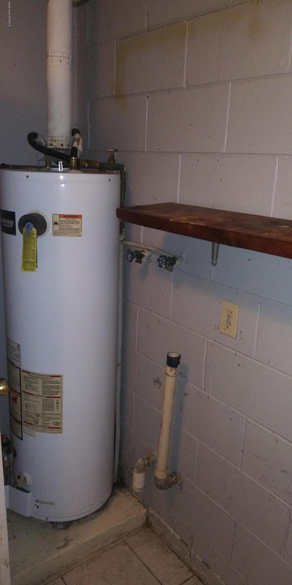 2465 Dolphin Road Titusville, FL 32780 - Photo 29 of 40 a view of water heater room