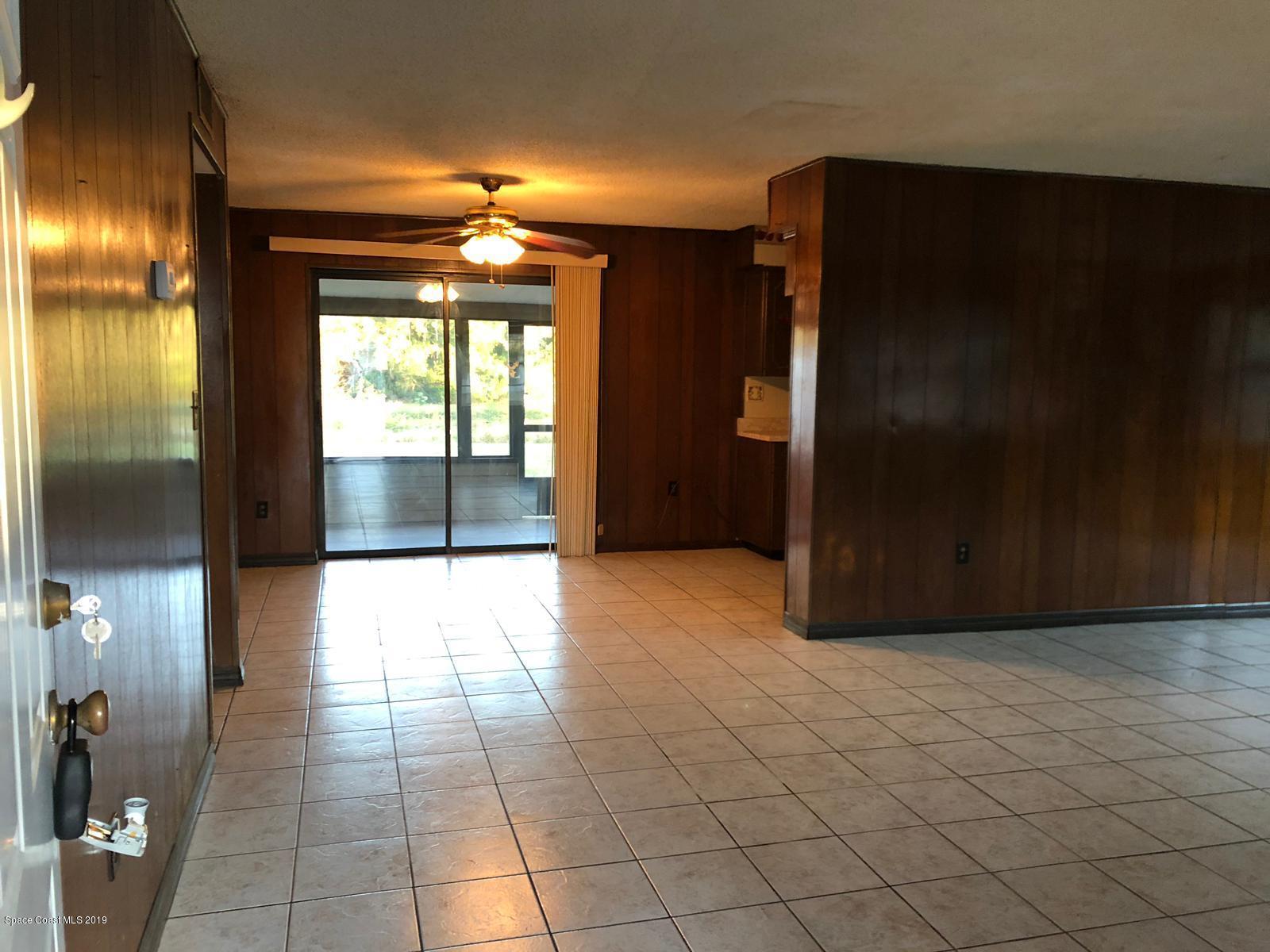 2465 Dolphin Road Titusville, FL 32780 - Photo 33 of 40 a view of entryway with a hallway