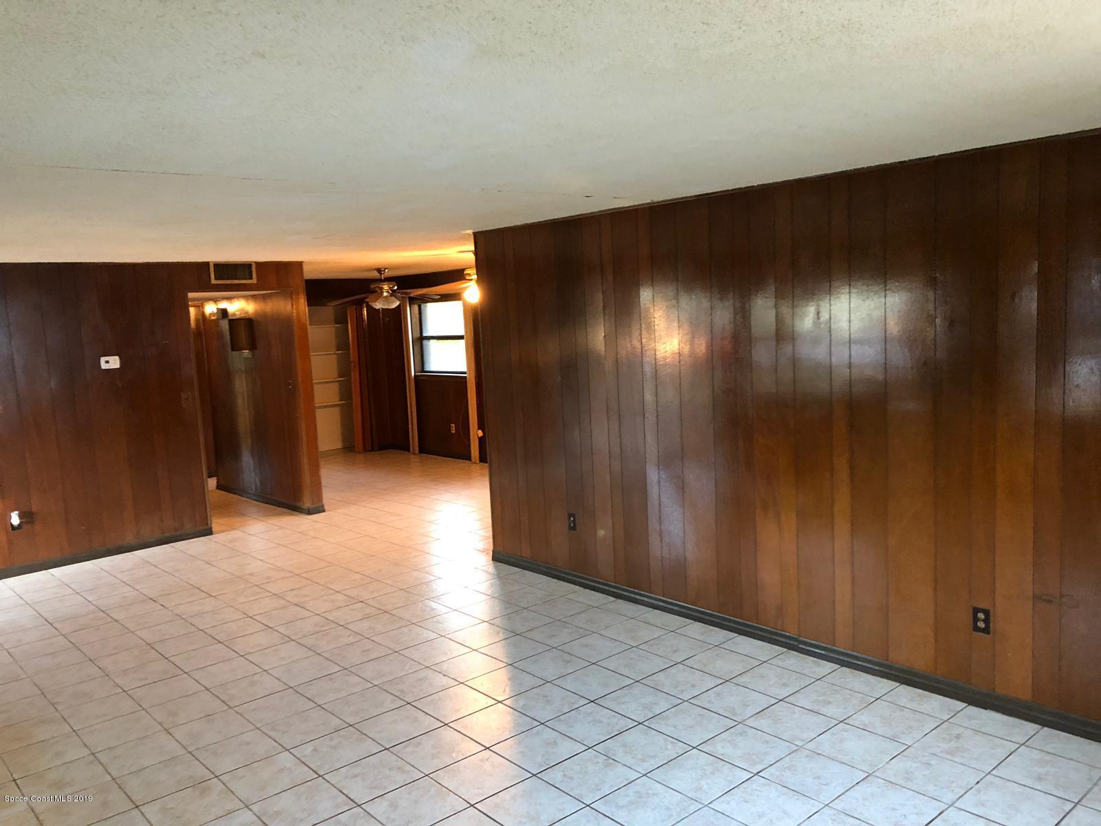 2465 Dolphin Road Titusville, FL 32780 - Photo 6 of 40 a view of an empty room
