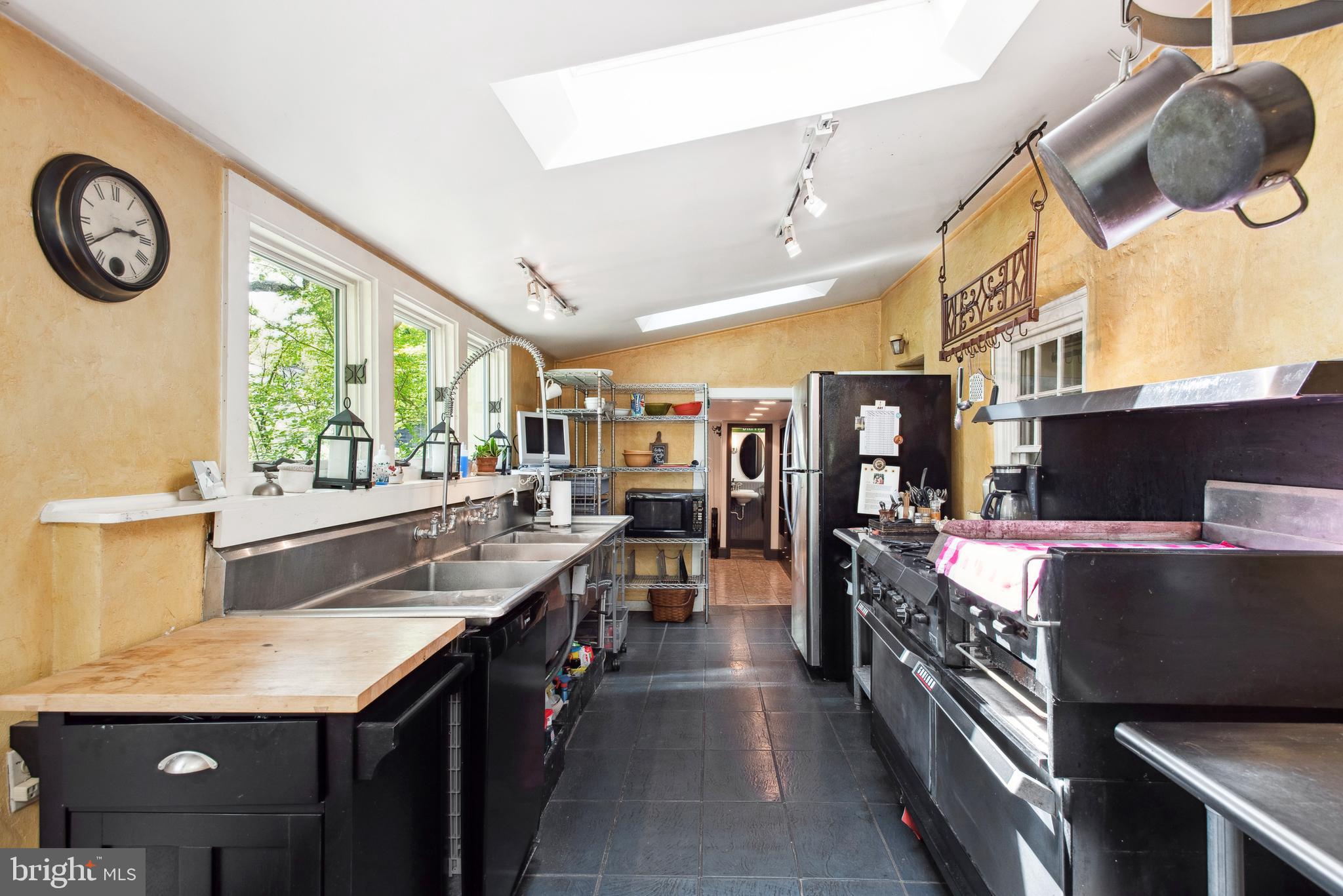 38 Old Lancaster Road Devon, PA 19333 - Photo 15 of 32 a kitchen with lots of counter top space