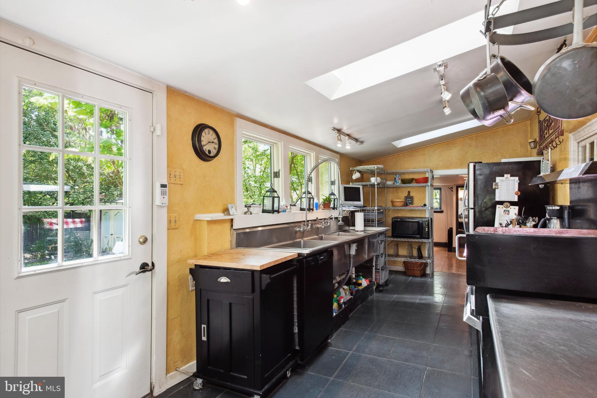 38 Old Lancaster Road Devon, PA 19333 - Photo 16 of 32 a kitchen with lots of counter top space