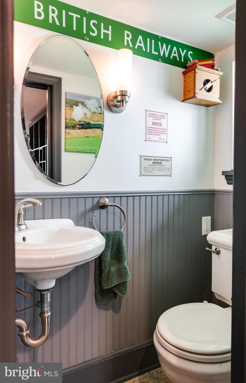 38 Old Lancaster Road Devon, PA 19333 - Photo 19 of 32 a bathroom with a sink a toilet and mirror