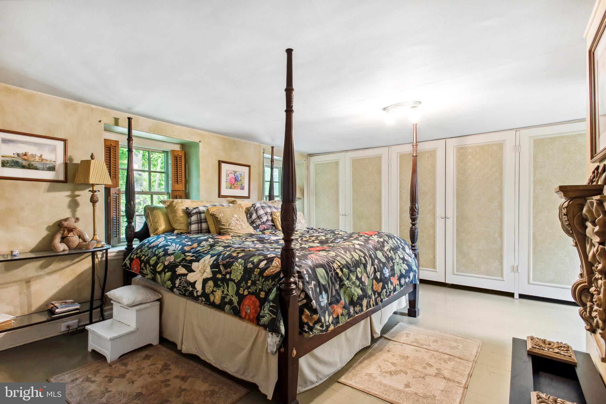 38 Old Lancaster Road Devon, PA 19333 - Photo 21 of 32 a bed room with a bed and a couch