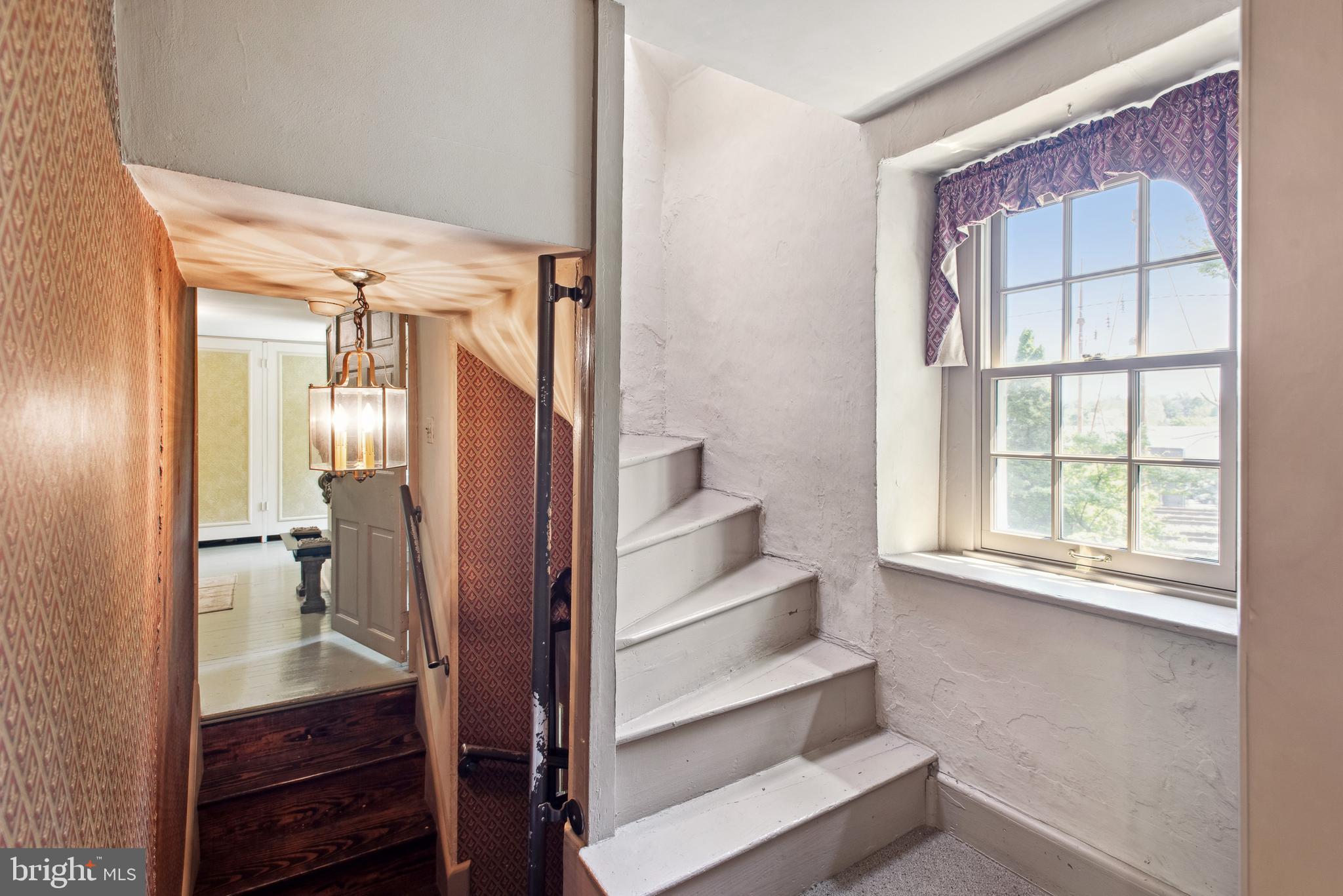 38 Old Lancaster Road Devon, PA 19333 - Photo 26 of 32 a view of front door with chair and bathroom