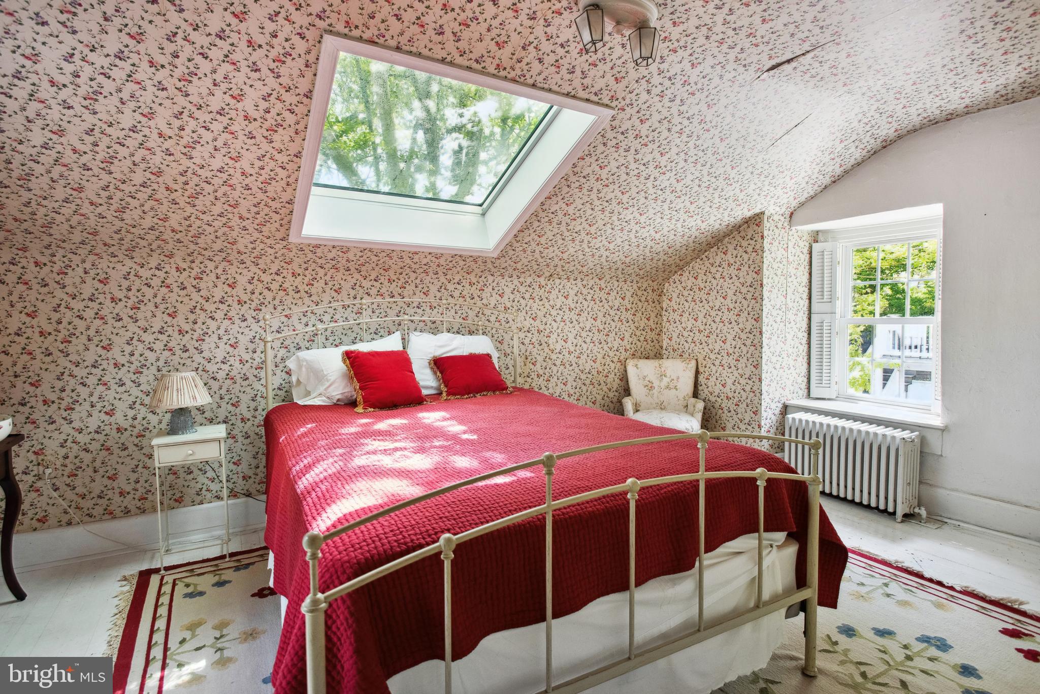 38 Old Lancaster Road Devon, PA 19333 - Photo 27 of 32 a bedroom with a bed and a window