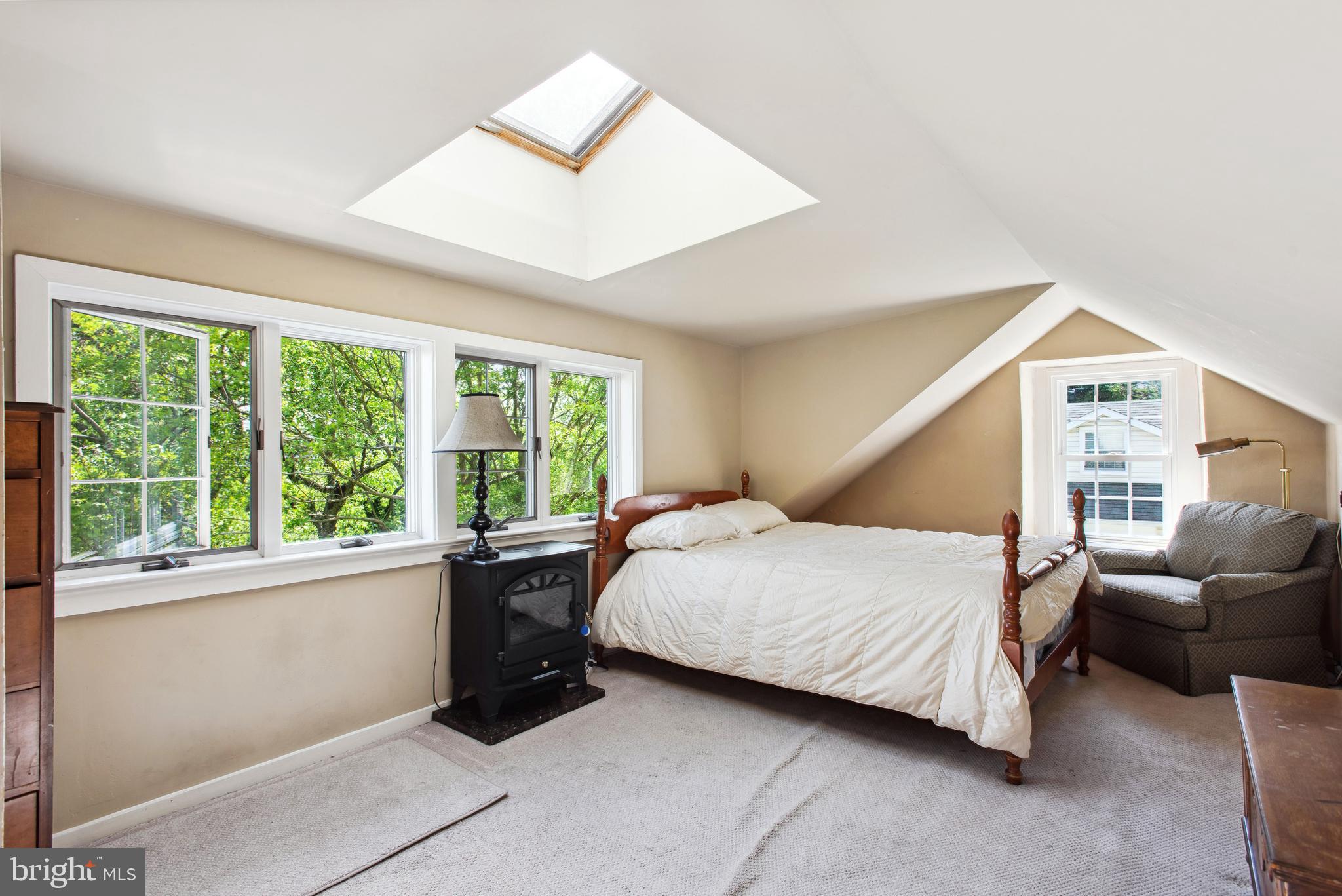 38 Old Lancaster Road Devon, PA 19333 - Photo 30 of 32 a bedroom with a bed and a large window