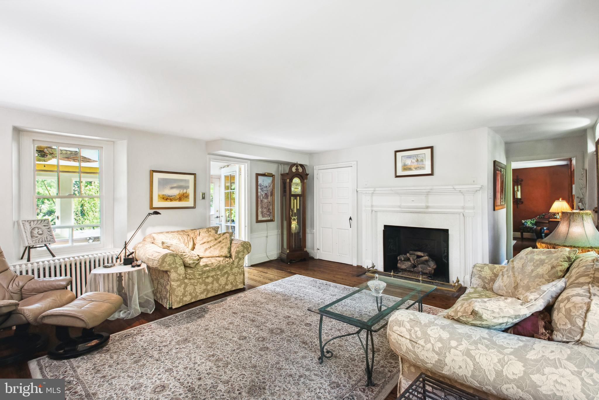 38 Old Lancaster Road Devon, PA 19333 - Photo 4 of 32 a living room with furniture and a fireplace