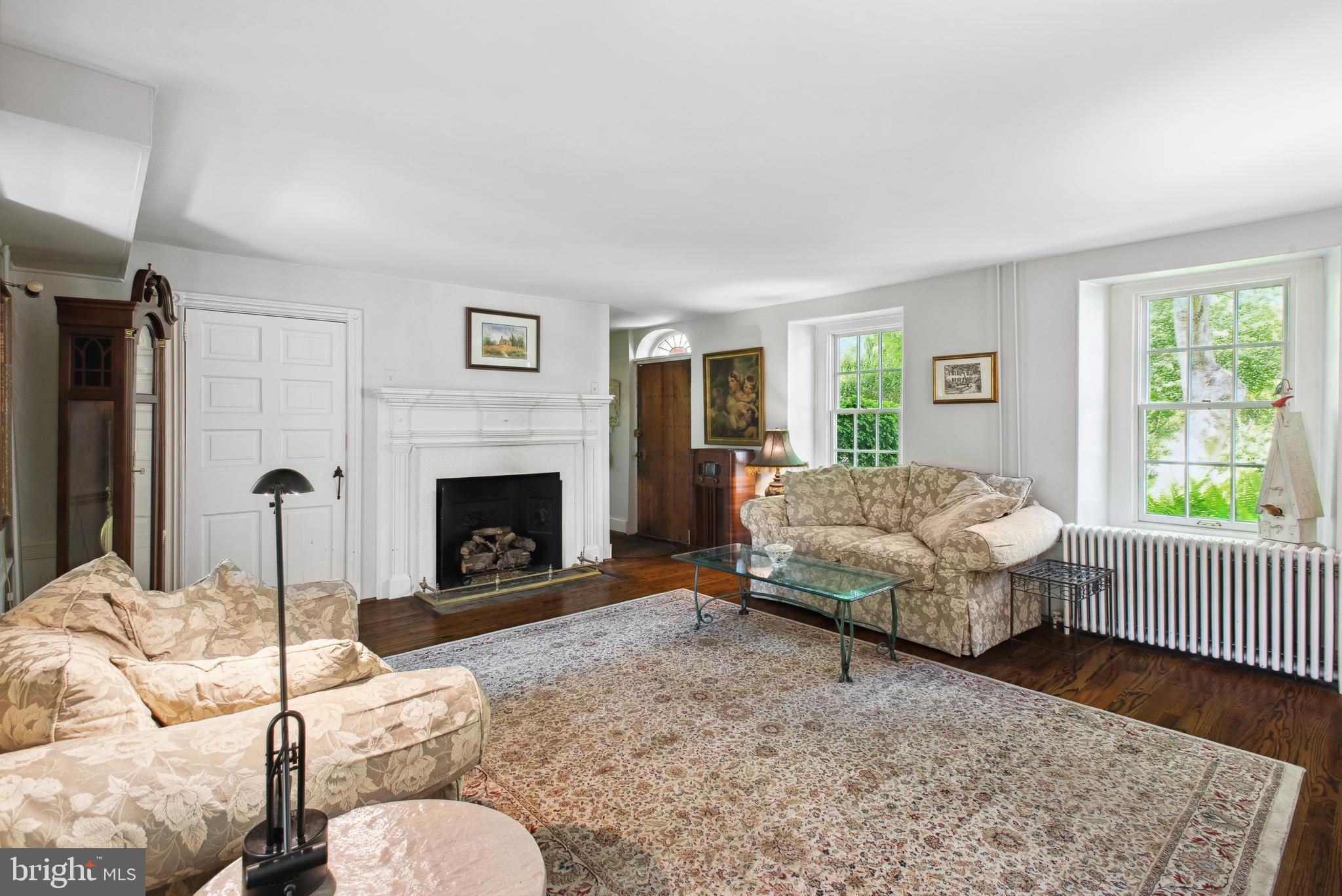 38 Old Lancaster Road Devon, PA 19333 - Photo 6 of 32 a living room with furniture and a fireplace