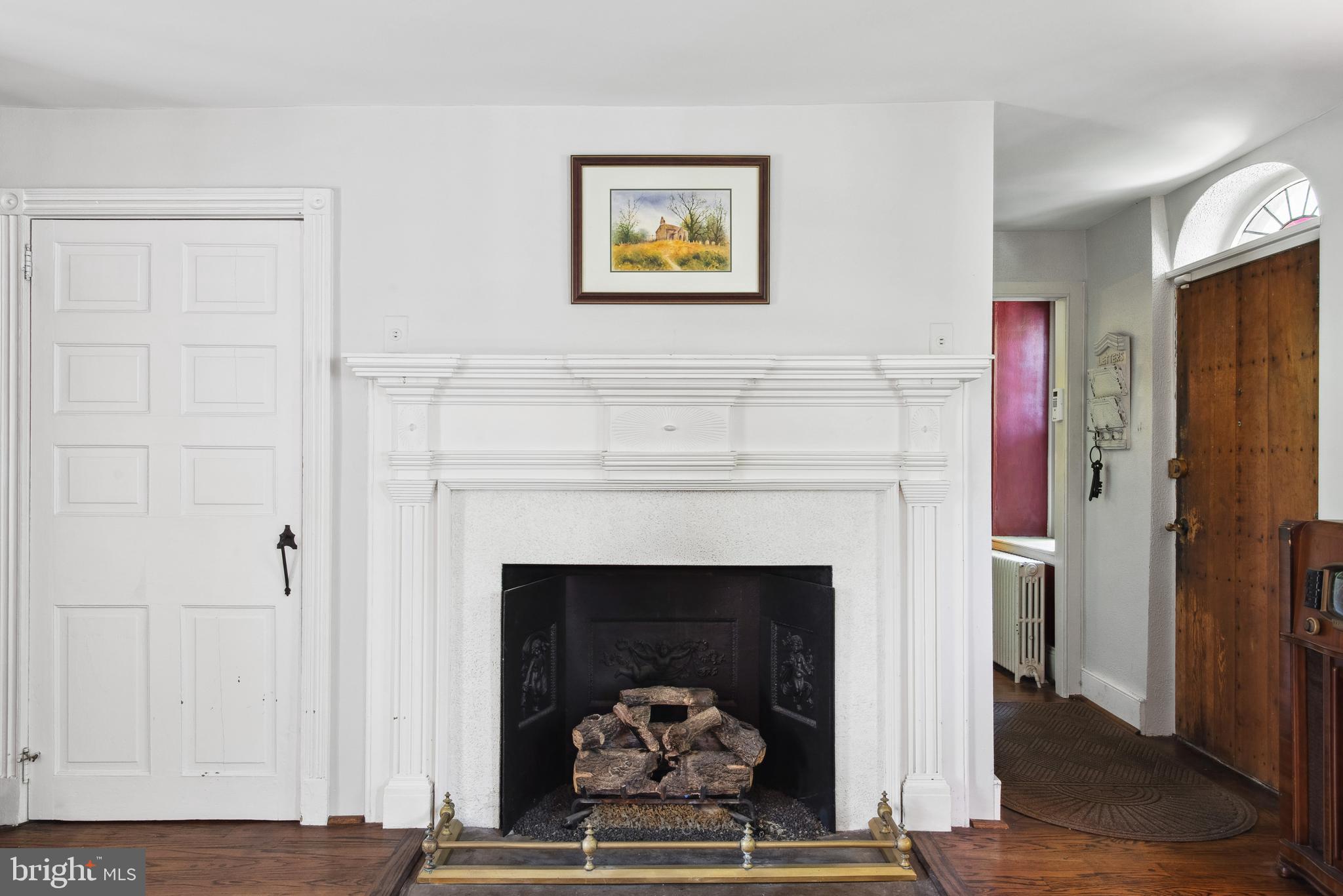 38 Old Lancaster Road Devon, PA 19333 - Photo 7 of 32 a living room with furniture and a fireplace