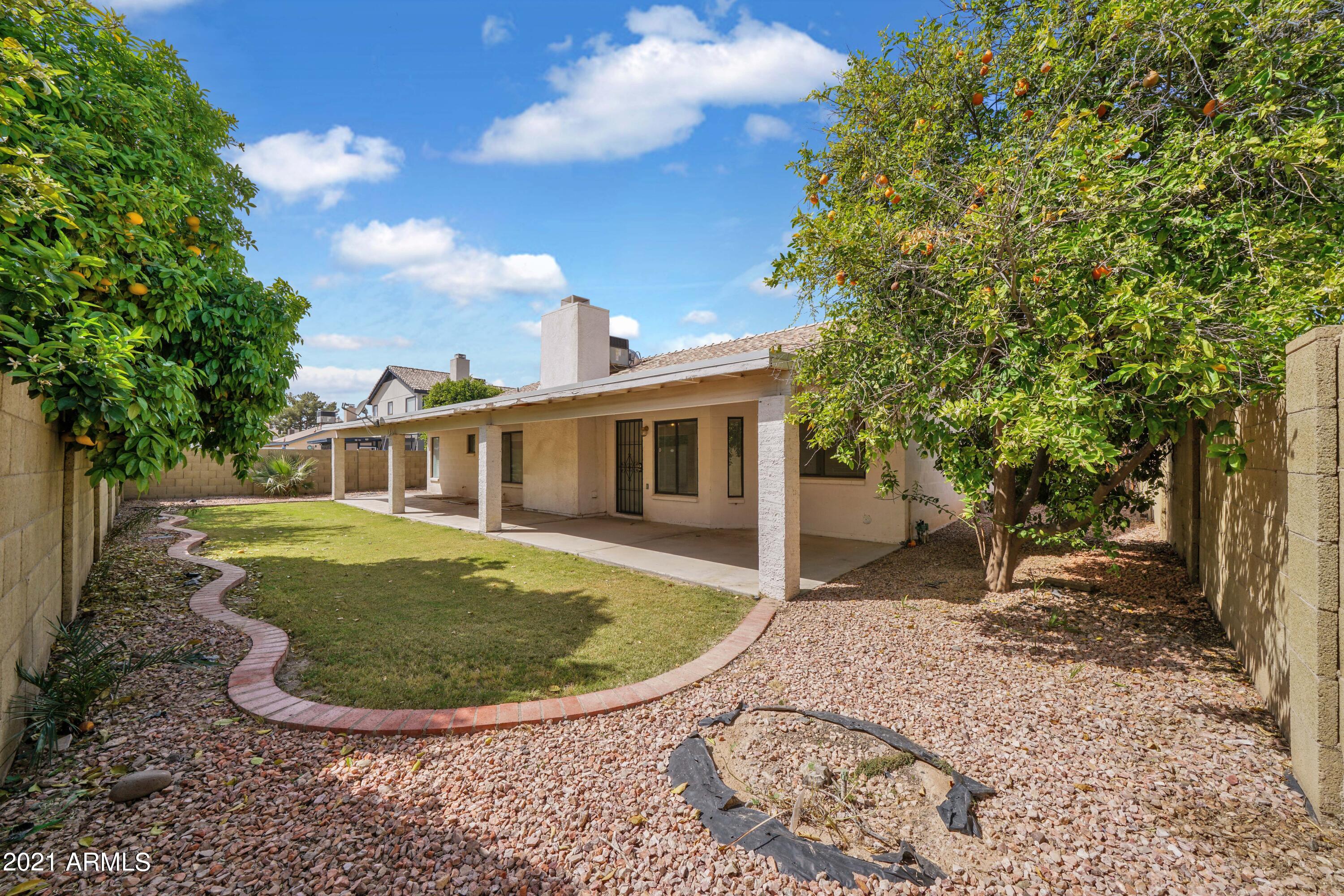 7749 West Redfield Road Peoria, AZ 85381 - Photo 40 of 45 Grass Backyard