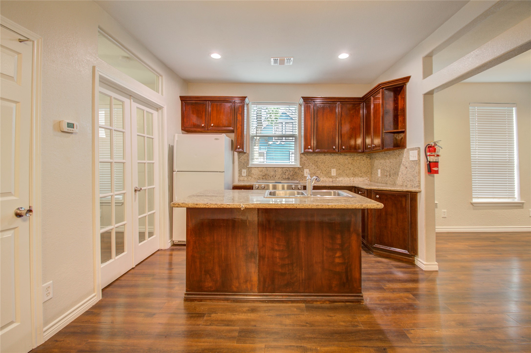 2119 Kane Street Houston, TX 77007 - Photo 16 of 29 a spacious bathroom with a sink and a mirror