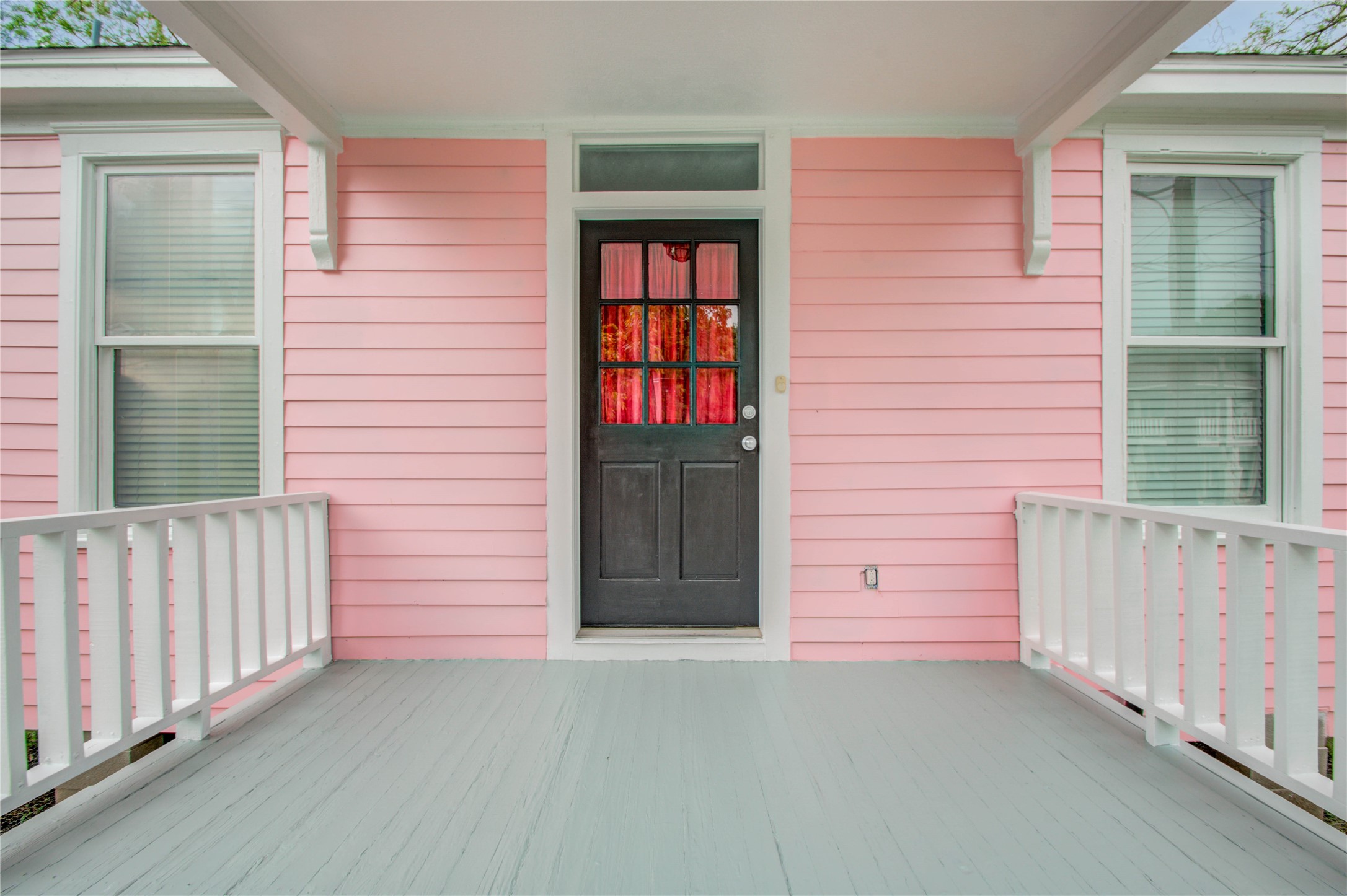 2119 Kane Street Houston, TX 77007 - Photo 4 of 29 a couple of potted plants in front of door