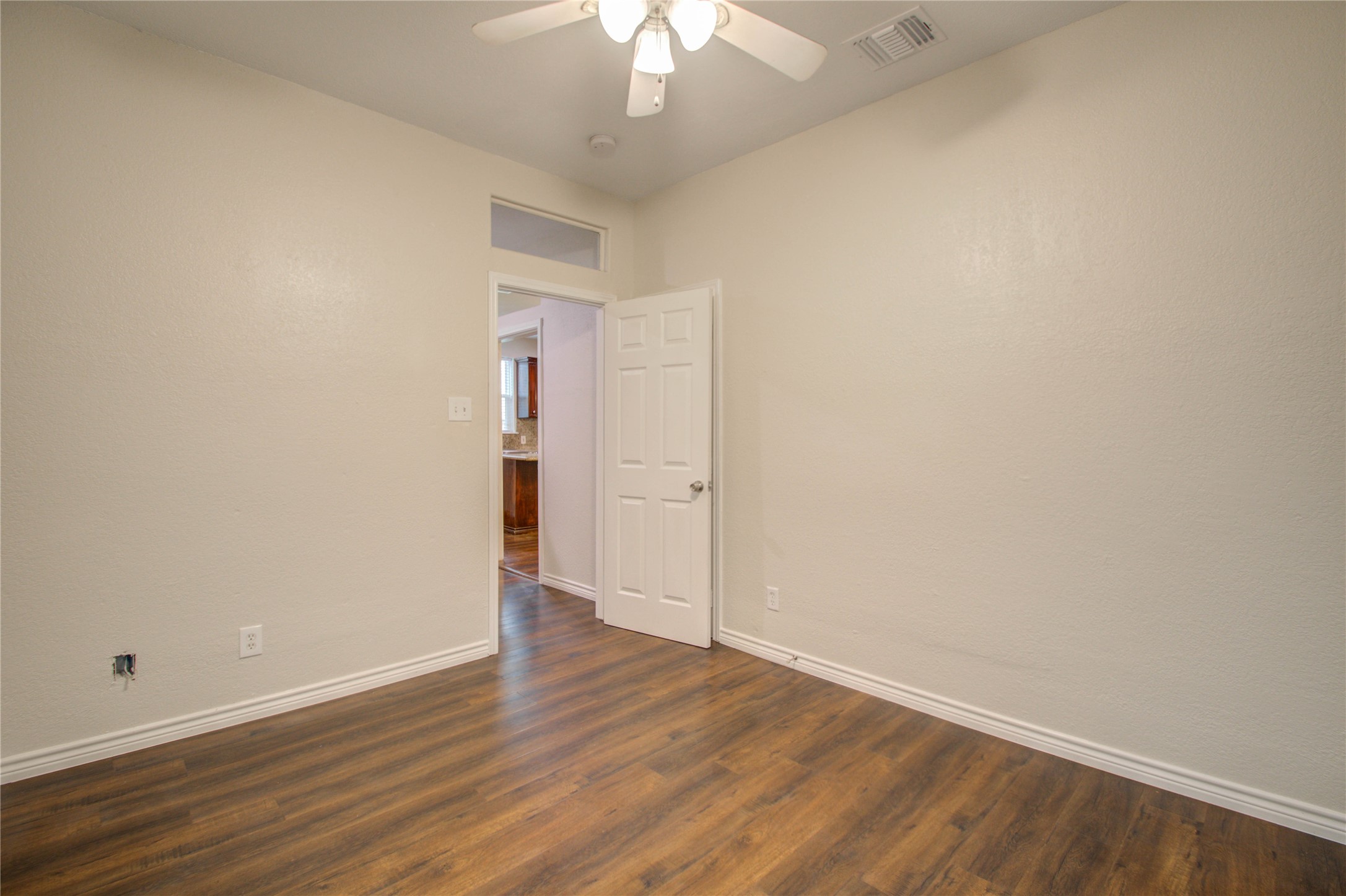 2119 Kane Street Houston, TX 77007 - Photo 9 of 29 wooden floor in an empty room