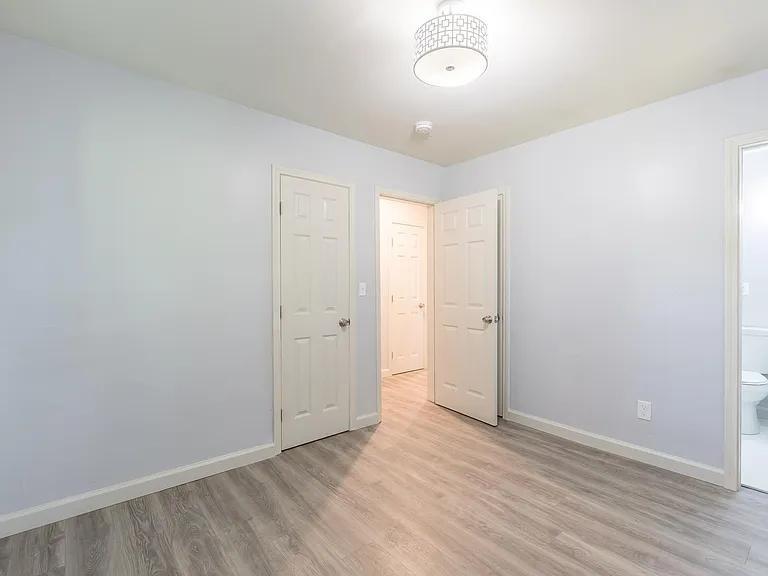 2077 Green Forrest Drive Decatur, GA 30032 - Photo 13 of 21 wooden floor in an empty room