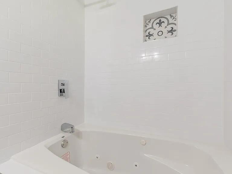 2077 Green Forrest Drive Decatur, GA 30032 - Photo 18 of 21 a bathroom with a bathtub