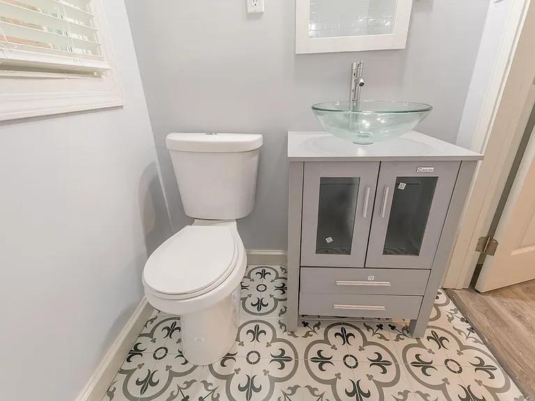 2077 Green Forrest Drive Decatur, GA 30032 - Photo 19 of 21 a bathroom with a toilet and a sink