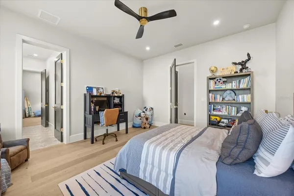 an aerial view of a house with a big yard