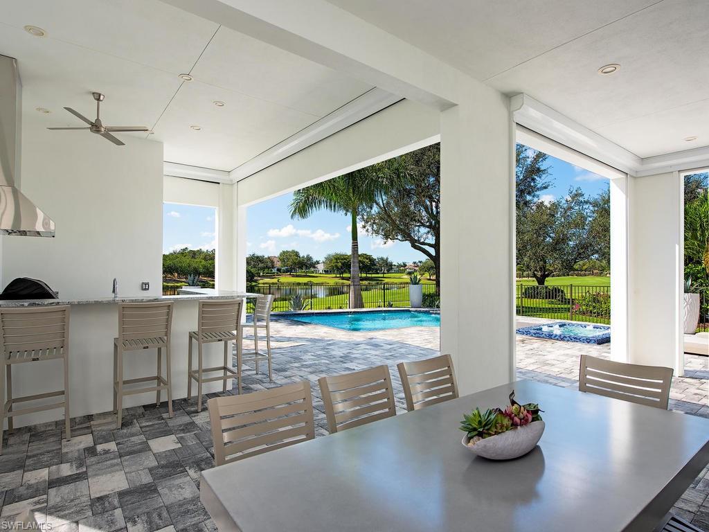 16868 Brightling Way Naples, FL 34110 - Photo 13 of 35 a living room with furniture and a open window