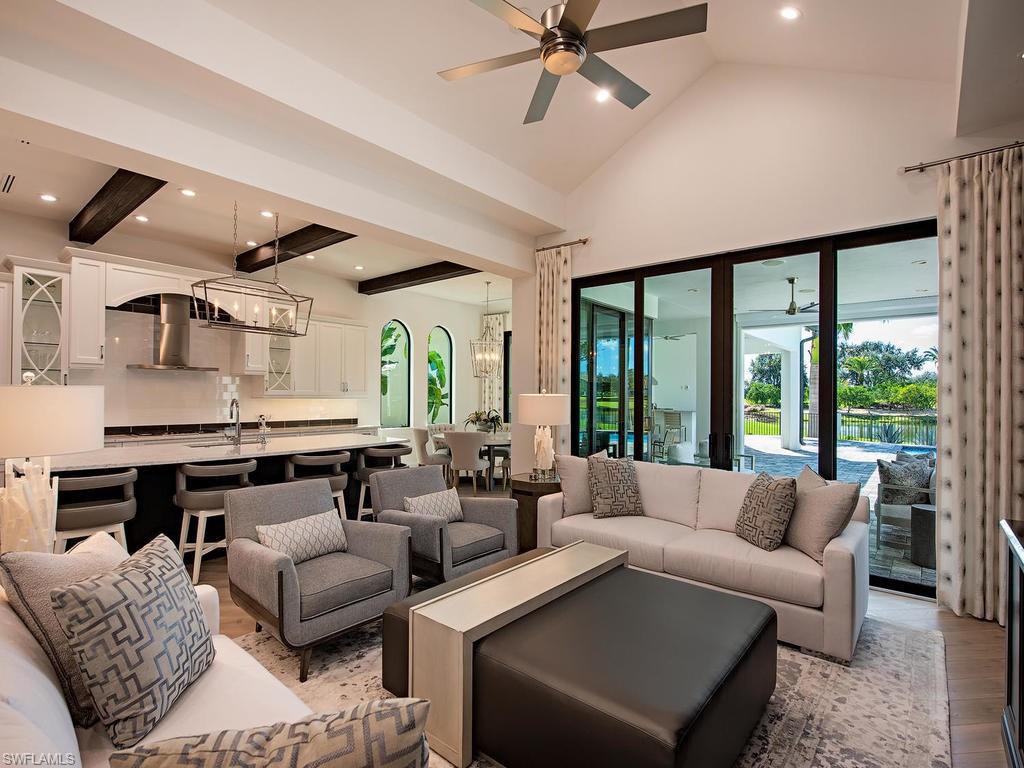 16868 Brightling Way Naples, FL 34110 - Photo 6 of 35 a living room with furniture and a large window
