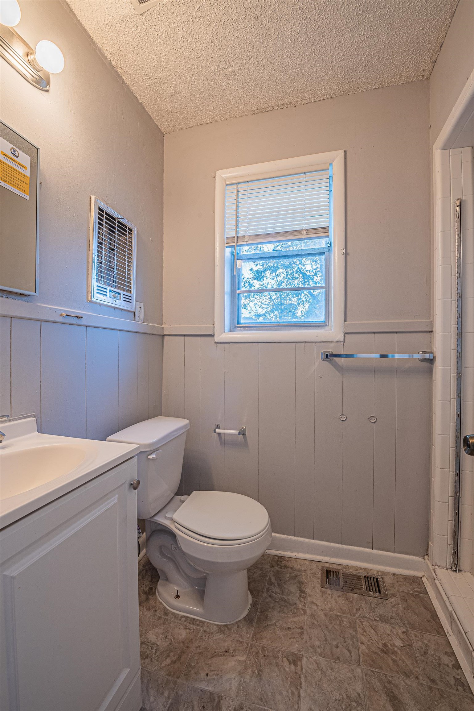 1109 Getwell Road Memphis, TN 38111 - Photo 17 of 22 a bathroom with a toilet and a sink