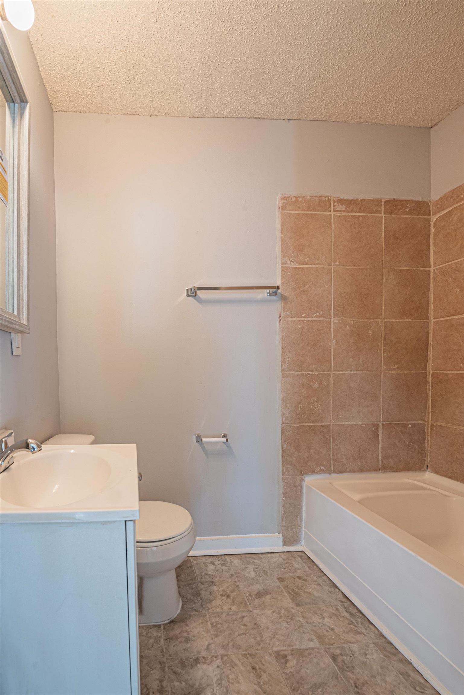 1109 Getwell Road Memphis, TN 38111 - Photo 21 of 22 a bathroom with a toilet a sink and bathtub