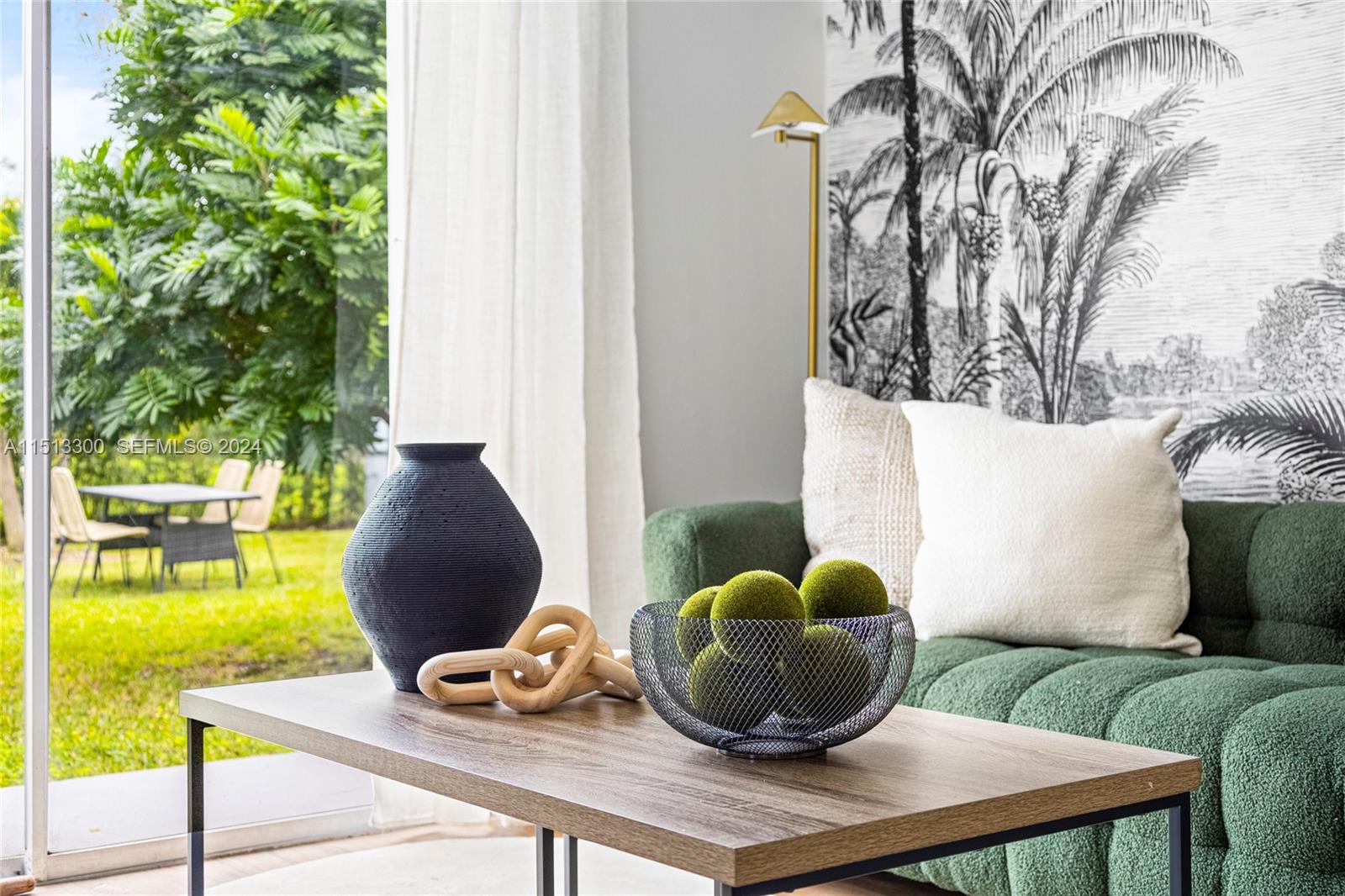 20075 Southwest 87th Place Cutler Bay, FL 33189 - Photo 7 of 32 a living room with furniture and a potted plant