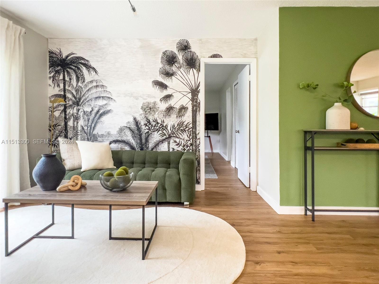 20075 Southwest 87th Place Cutler Bay, FL 33189 - Photo 8 of 32 a living room with furniture and wooden floor