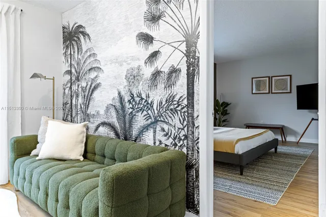 a bedroom with a bed and a couch