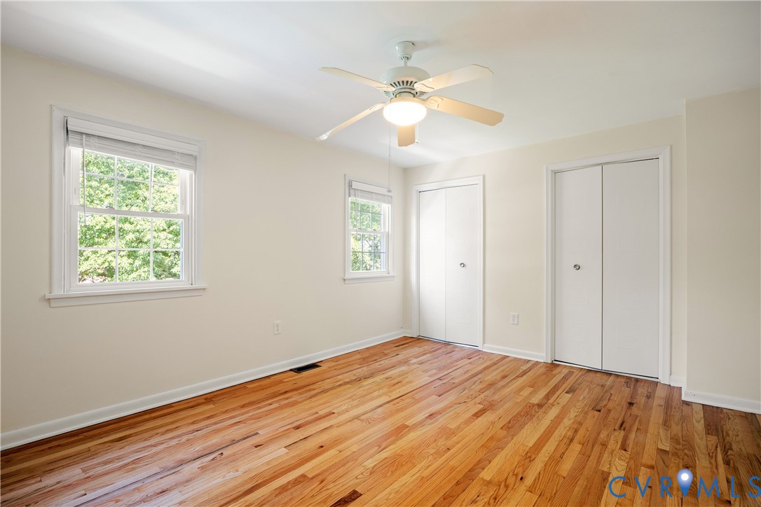 9129 Derbyshire Road, Unit E Henrico, VA 23229 - Photo 25 of 36 Room featuring wood-finish flooring and two window