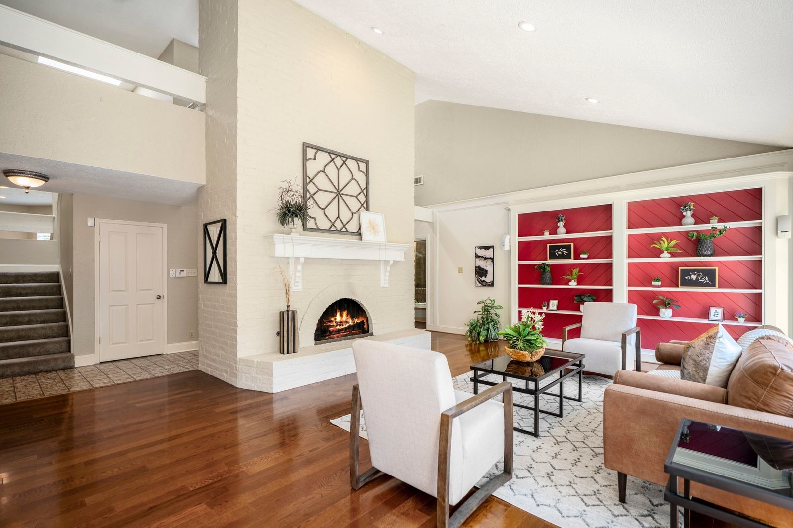 1306 Riverview Court Houston, TX 77077 - Photo 11 of 44 a living room with furniture and a fireplace