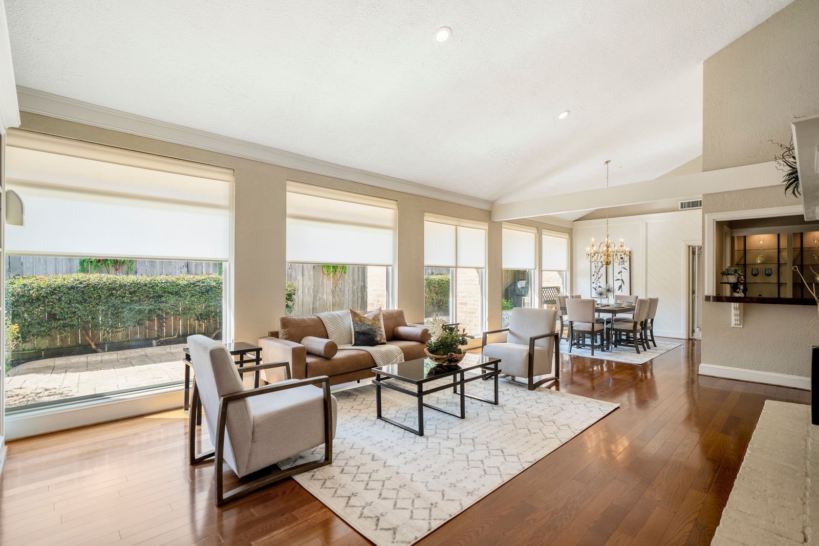 1306 Riverview Court Houston, TX 77077 - Photo 12 of 44 a living room with furniture and a large window