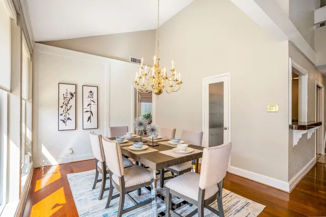 a kitchen with sink and cabinets