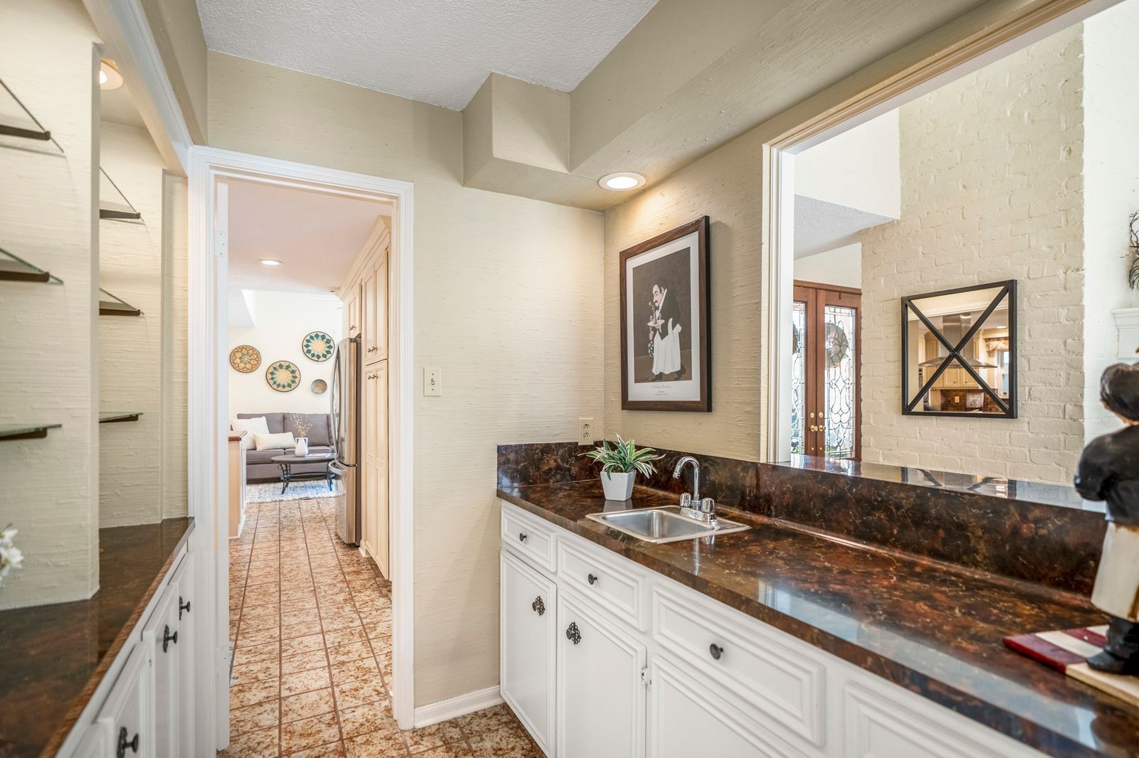 1306 Riverview Court Houston, TX 77077 - Photo 16 of 44 a spacious bathroom with a sink double vanity and a mirror