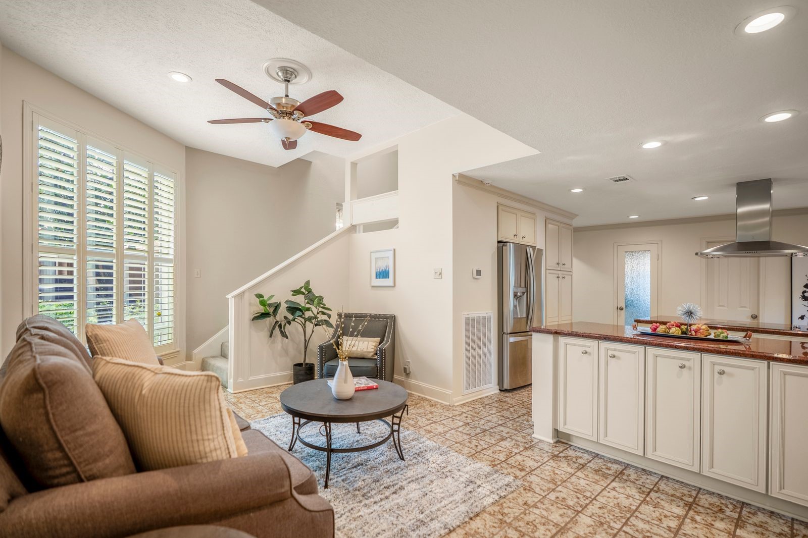 1306 Riverview Court Houston, TX 77077 - Photo 20 of 44 a living room with furniture and a large window